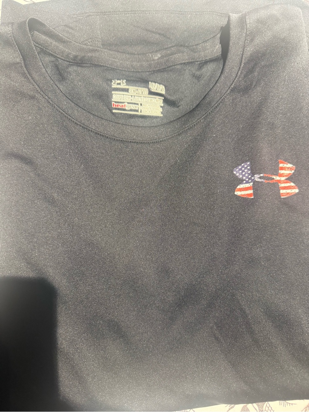 Under Armour women’s  Black HeatGear Crew Neck T-Shirt with Flag Logo